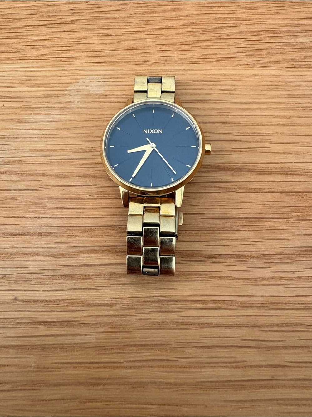 Nixon Gold Tone Watch with Black Dial